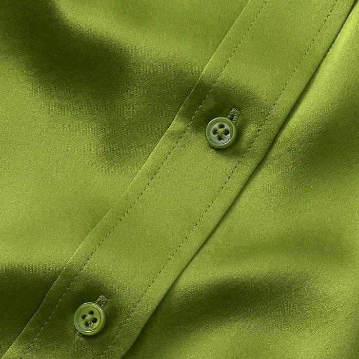 High-shine silk satin in our punchy Sicilian Olive colourway. This 100% silk is drapey and soft next to skin. We have teamed it with sporty rib cuffs for added comfort and style. 