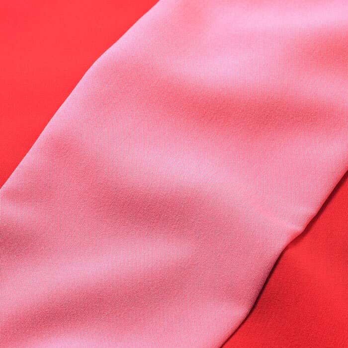 Peach touch twill in a vibrant and unexpected colour combination of Burnt Orange and Candy Pink. This supersoft fabric is heavy and holds the palazzo leg shape. 