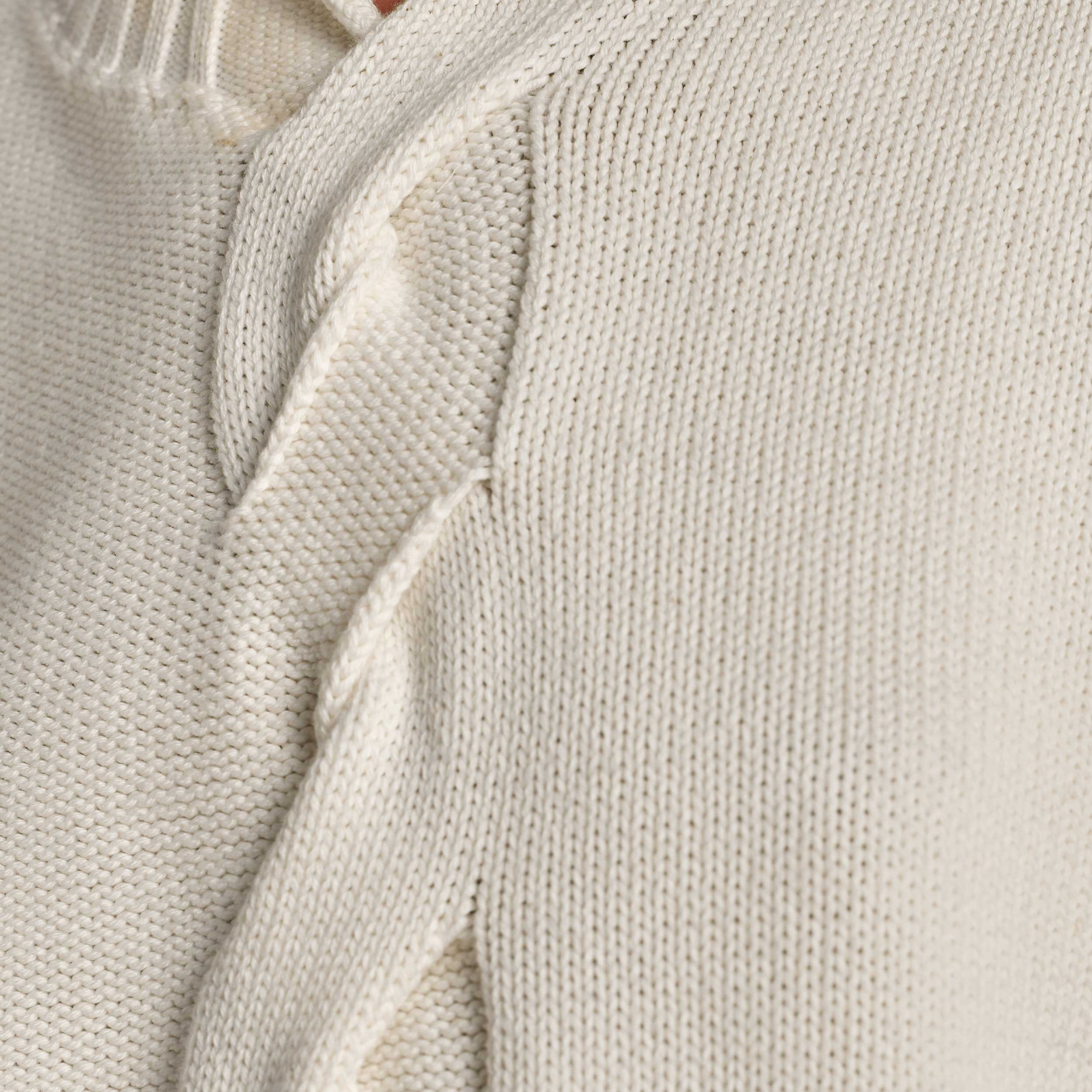 The chunky twisted cable detailing down centre front offers a modern take on a classic cable knit sweater.