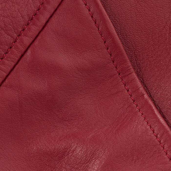 Dyed-through leather with a semi-shine finish. This premium by-product leather is a supersoft, luxe texture clash for your winter wardrobe. Lined for comfort.