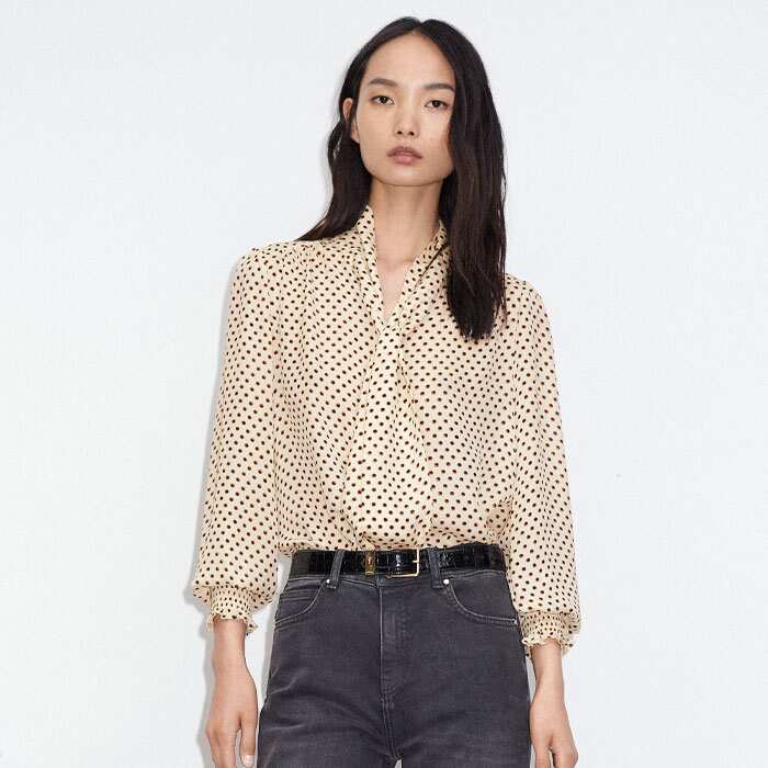 For a masculine-meets-feminine contradiction, pair it with our Silk Halo Spot Print Long Sleeve Blouse.