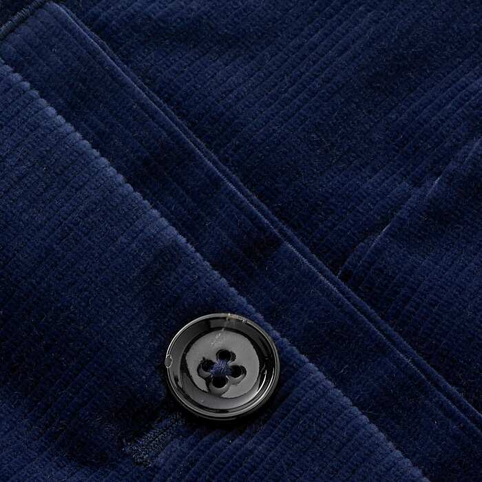 Crafted from luxurious Italian cord, this velvet-touch fine cord is supersoft and drapey. In a rich deep-blue tone, this work-to-weekend trouser is 100% cotton and features a modern black button for easy styling.