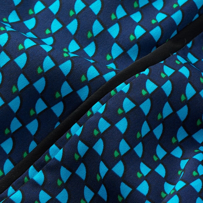 Crease free and machine washable, this easy-care fabric features our Bespoke Hexagon Geo print in a combination of navy and turquoise. This 'non-print' is a versatile AM-PM solution combined with black side stripes and black in the print for easy styling.