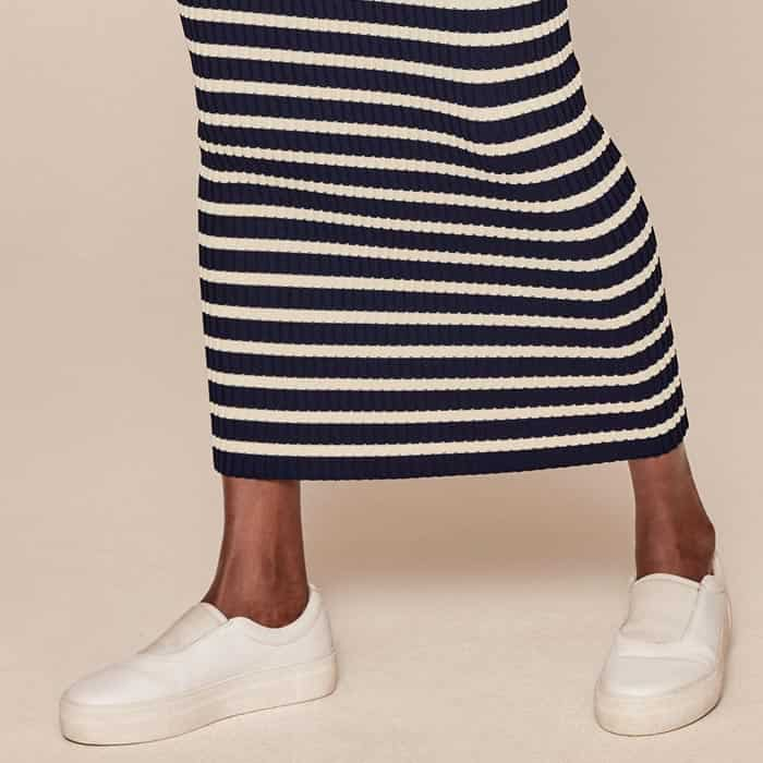 Designed so that the navy stripes are thicker, a technique that flatters in all the right places.