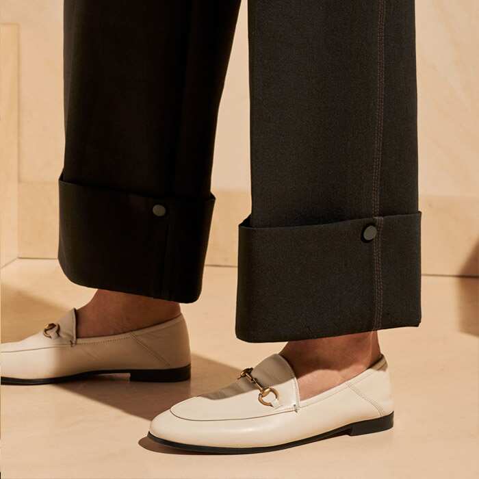 Wear full-length or cropped using the subtle matte press studs - perfect for every height and rainy days.