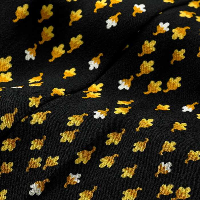 Crafted from 100% breathable viscose fabric in a Flower Bud print that combines vibrant yellow and black for easy styling.
With 100% Ecoverso sustainable lining.